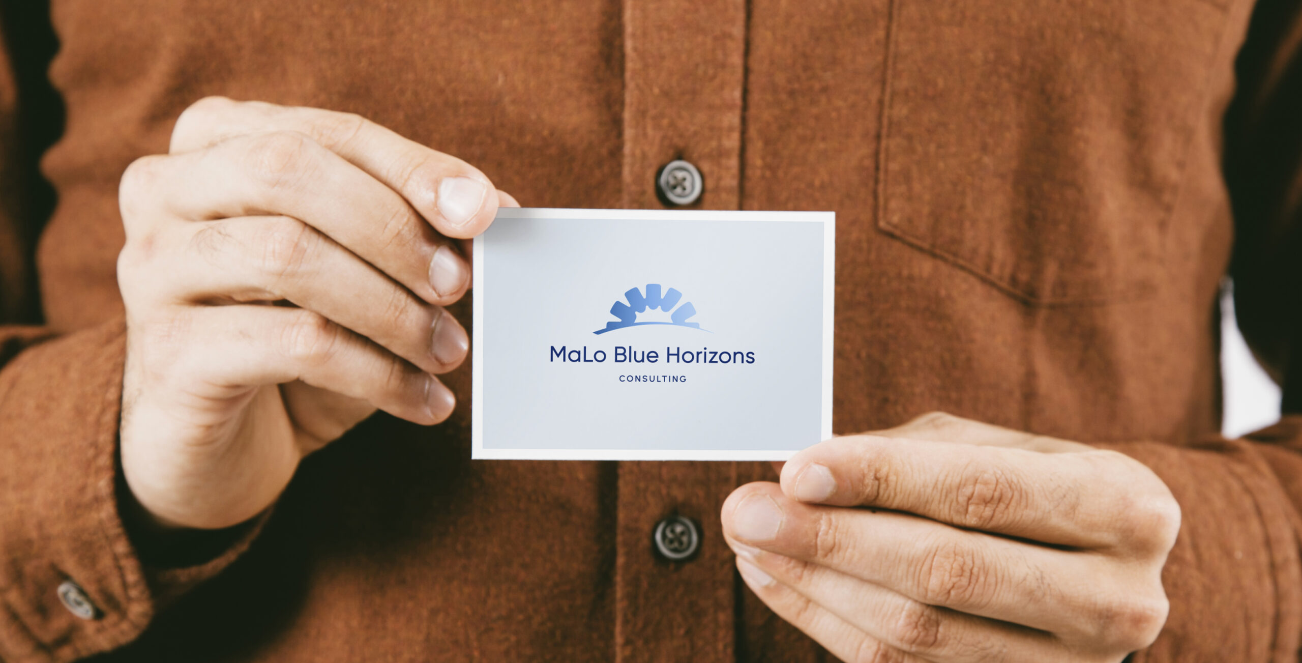 MaLo Blue Horizons logo on a business card